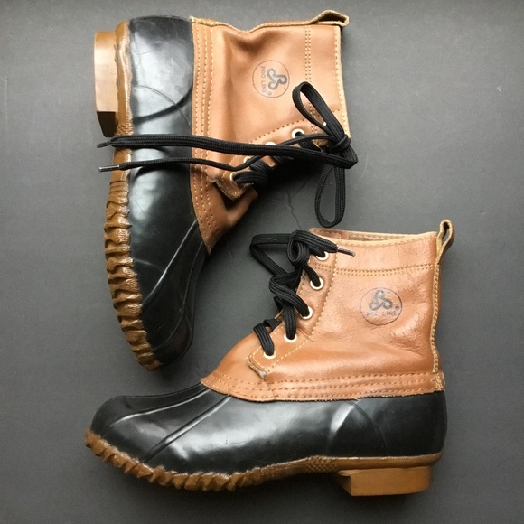 tan and black duck boots